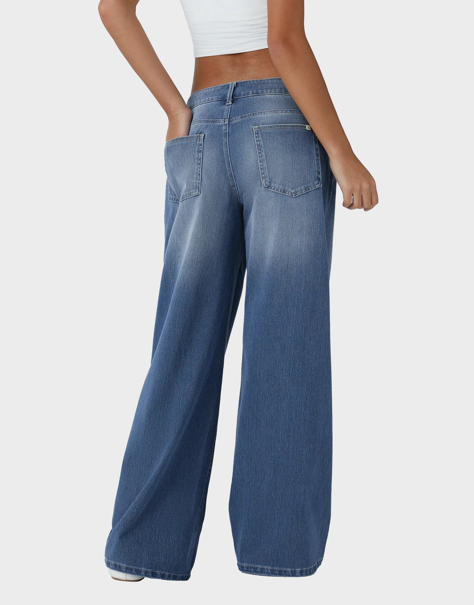Jean asymétrique taille basse, ample et jambes larges